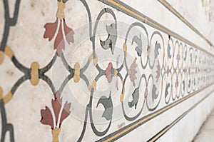 Decorative elements created by applying paint, stucco, stone inlays and carvings