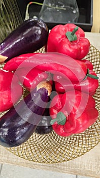 decorative elements red peppers, eggplant on plate