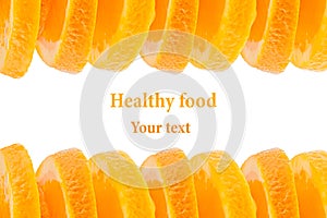 Decorative ending from a pile of slices of juicy orange on a white background. Fruit border, frame. Isolated. Food background.