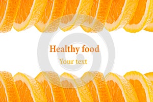 Decorative ending from a pile of slices of juicy orange on a white background. Fruit border, frame. Isolated. Food background. Cop