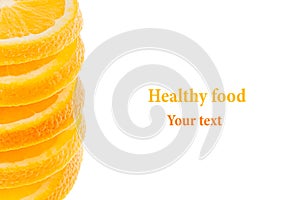 Decorative ending from a pile of slices of juicy orange on a white background. Fruit border, frame. Isolated. Food background.