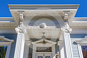 decorative entablature above grand entrance photo