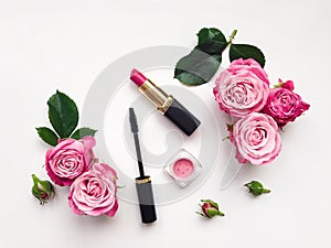 Decorative flat lay composition with cosmetics and flowers