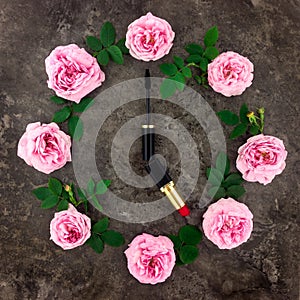 Decorative flat lay composition with cosmetics and flowers. Top view