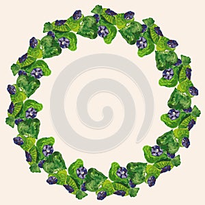 Decorative floral wreath from watercolor drawings of blooming purple flowers in green leaves