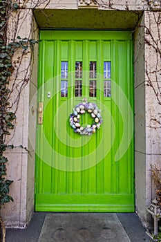 Decorative flowers bloom in pots with Easter eggs