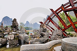 Decorative fountain with water mill in Xingping Fishing Village, Yangshuo County