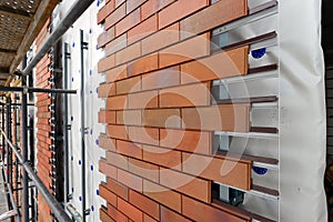 Decorative ventilated facade of a residential building