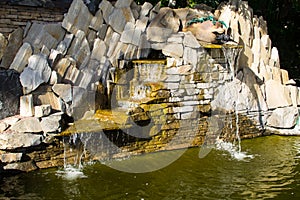 Decorative garden stone waterfall pond