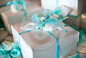 Decorative gift-wrapped party favor in a box