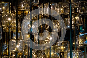 Decorative glass light fixtures on metal poles