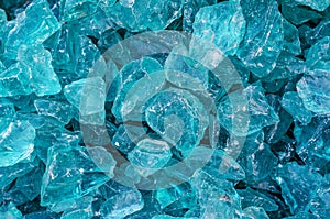 Decorative glass stones, chipped glass. Shiny stones background
