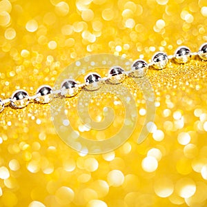 Decorative gold background with sparkling