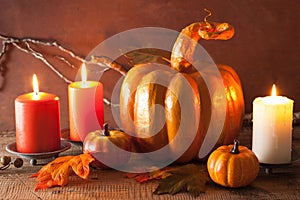 Decorative golden papier-mache pumpkin and autumn leaves for hal