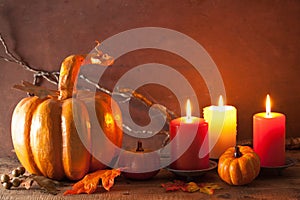 Decorative golden papier-mache pumpkin and autumn leaves for hal