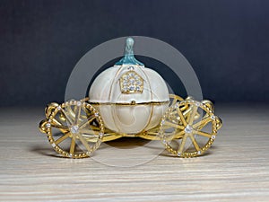 Decorative golden pumpkin carriage from Cinderella close-up