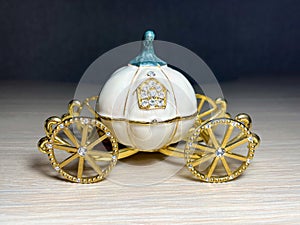 Decorative golden pumpkin carriage from Cinderella close-up