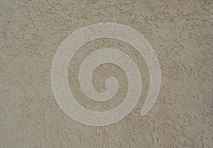 Decorative grain plaster with a chaotic pattern
