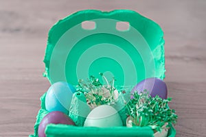 Decorative handmade easter egg present box with eggs and cress