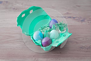 Decorative handmade easter egg present box with eggs and cress