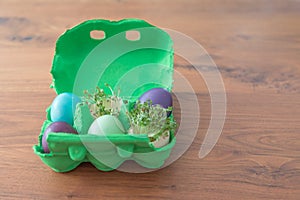 Decorative handmade easter egg present box with eggs and cress