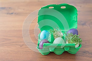 Decorative handmade easter egg present box with eggs and cress