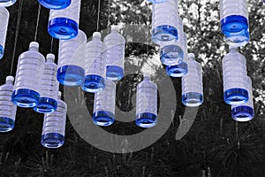 Decorative hanging plastic bottles