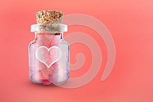 Decorative heart background with lot of valentines hearts. Red crochet heart in glass bottle, Love concept, Valentine\'s Day, 3d