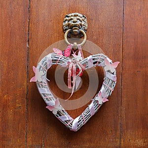 Decorative heart at an old doorknocker