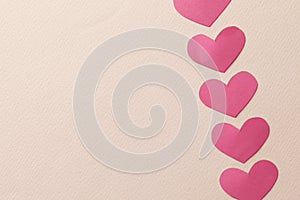 Decorative hearts close-up on a colored background. Valentine`s day decor concept.