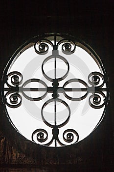 Decorative ironwork in circular window
