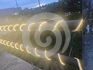 decorative lights wrapped around the bridge