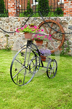 Decorative metal bicycle with flowers