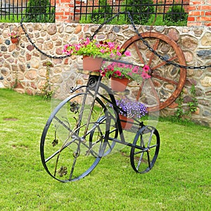 Decorative metal bicycle with flowers