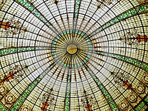 Decorative multi-colored glass dome with concentric lines
