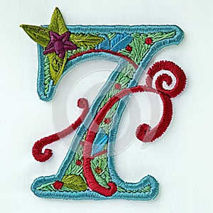 A decorative number 7 is embroidered on a white surface, embroidery on white background