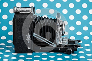 Decorative Old Antique Cameras on Blue Background