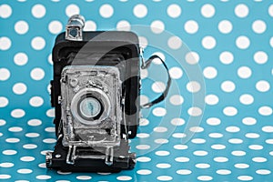 Decorative Old Antique Cameras on Blue Background