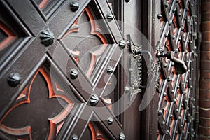 Decorative old wooden church door