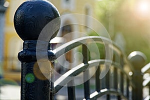 Decorative, ornamental, iron forged fence pattern. Black and white photo. Steel construction and design.