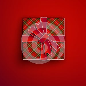 Decorative paper cut gift box isolated on red background. Red bow, ribbon festive element for holiday design, christmas greeting