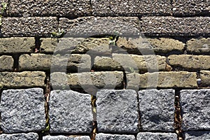 Decorative pattern of three different stone types used next to eachother photo