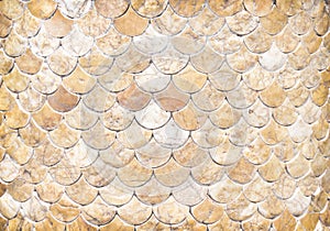 Decorative pieces of marble texture on concrete wall  in many layer fish  scale shaped patterns  , horizontal background