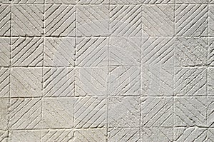 Decorative plaster with relief lines and squares