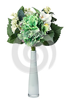 Decorative plastic flowers in a vase isolated on white