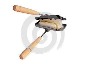 Decorative portable toaster or sandwich pan camping on white
