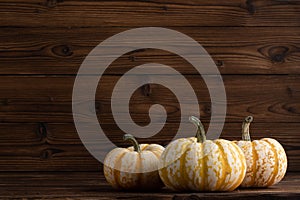 Decorative Pumpkins on wood