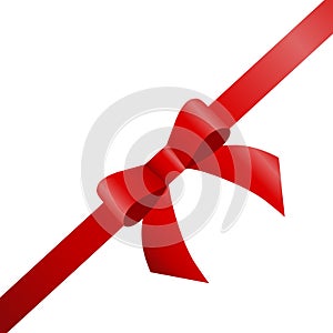 Decorative red bow with diagonally ribbon on the corner.