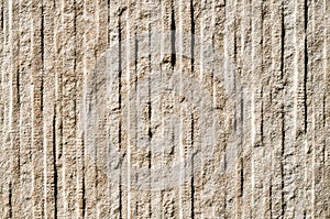 Decorative relief cladding slab imitating stone on wall photo