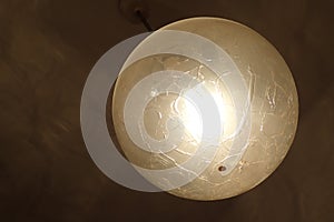 Decorative round ceiling light shining